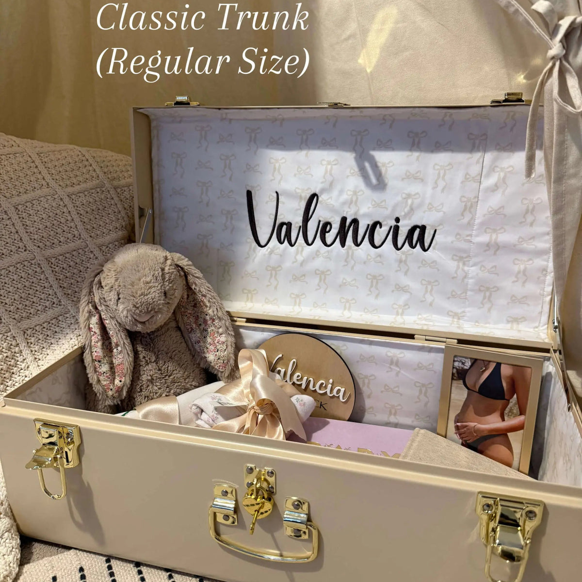 Beige suitcase with &