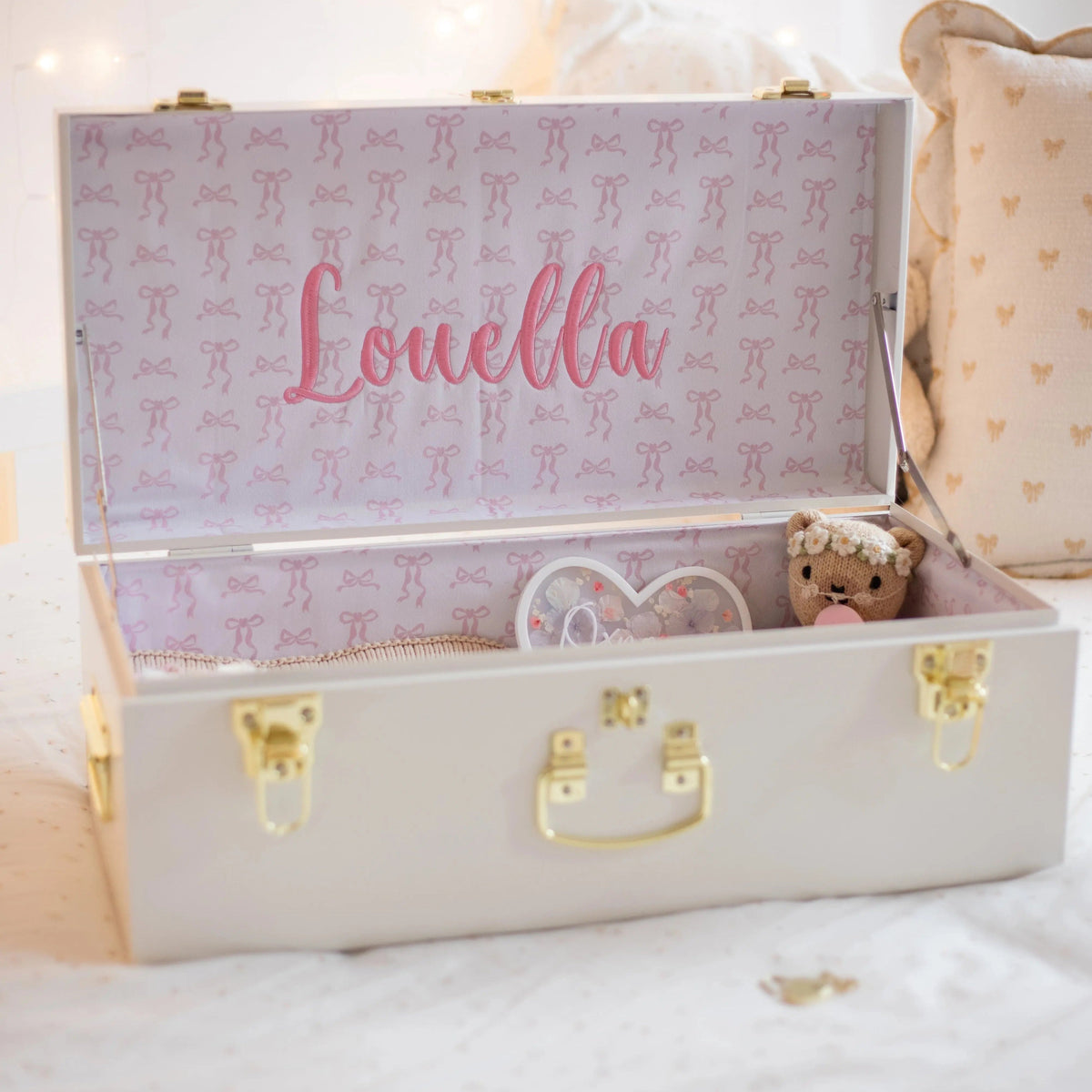 White suitcase with &