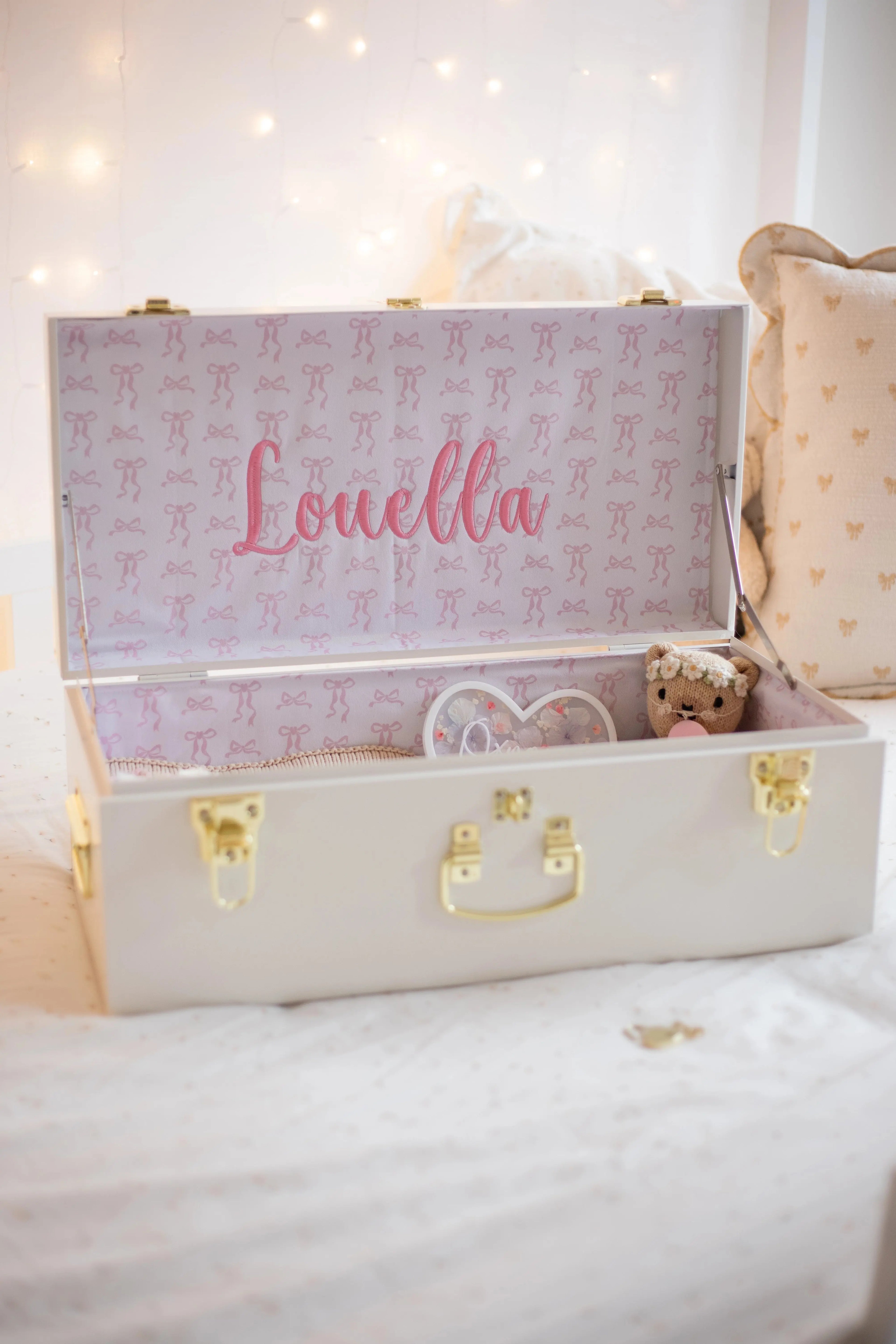 White suitcase with &